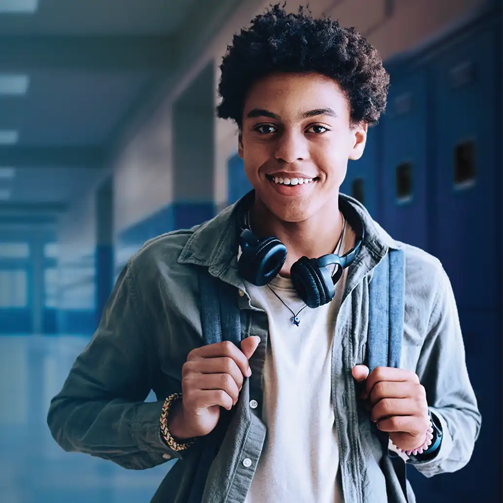 Kid In school hallway