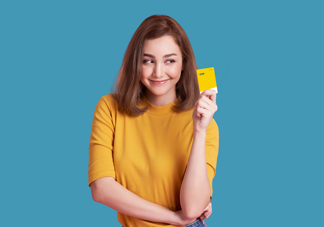 woman holding rewards visa card_290258759--1080 woman holding Credit card Visa